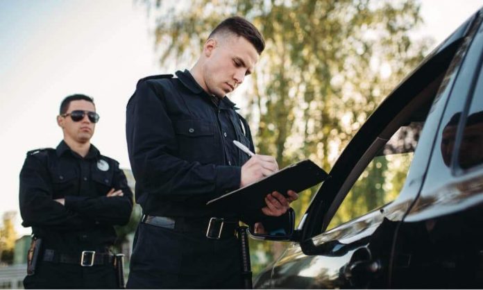 Why do Cops Touch the Back of your Car?