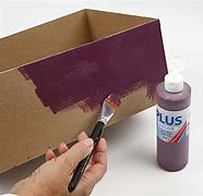 decorate the car with paint, markers, or other materials