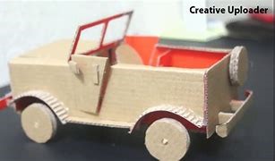 Your cardboard car will be finished and ready to play with once the accessories have dried
