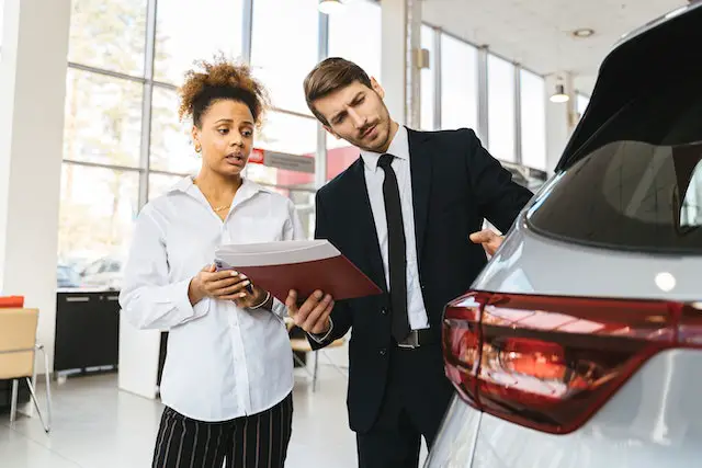 How can dealerships provide accurate market value prices for their customers?